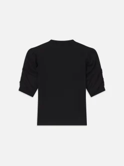 Frankie Tee in Noir
